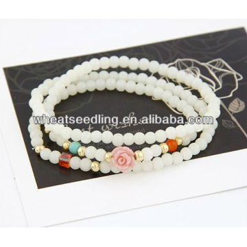 Forme la flor de plástico Beades pulsera para niña 11030432